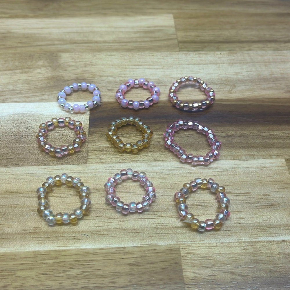 9pc gold pink and translucent beaded rings